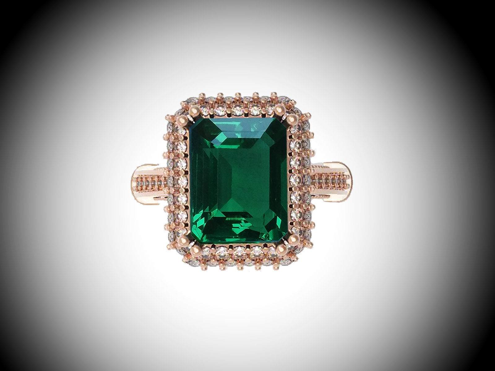 18K Rose Gold Emerald Emerald cut Engagement Ring surrounded with Diamonds